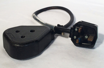 Tall slender porcelain bottle with natural clay textured body and cork stopper.